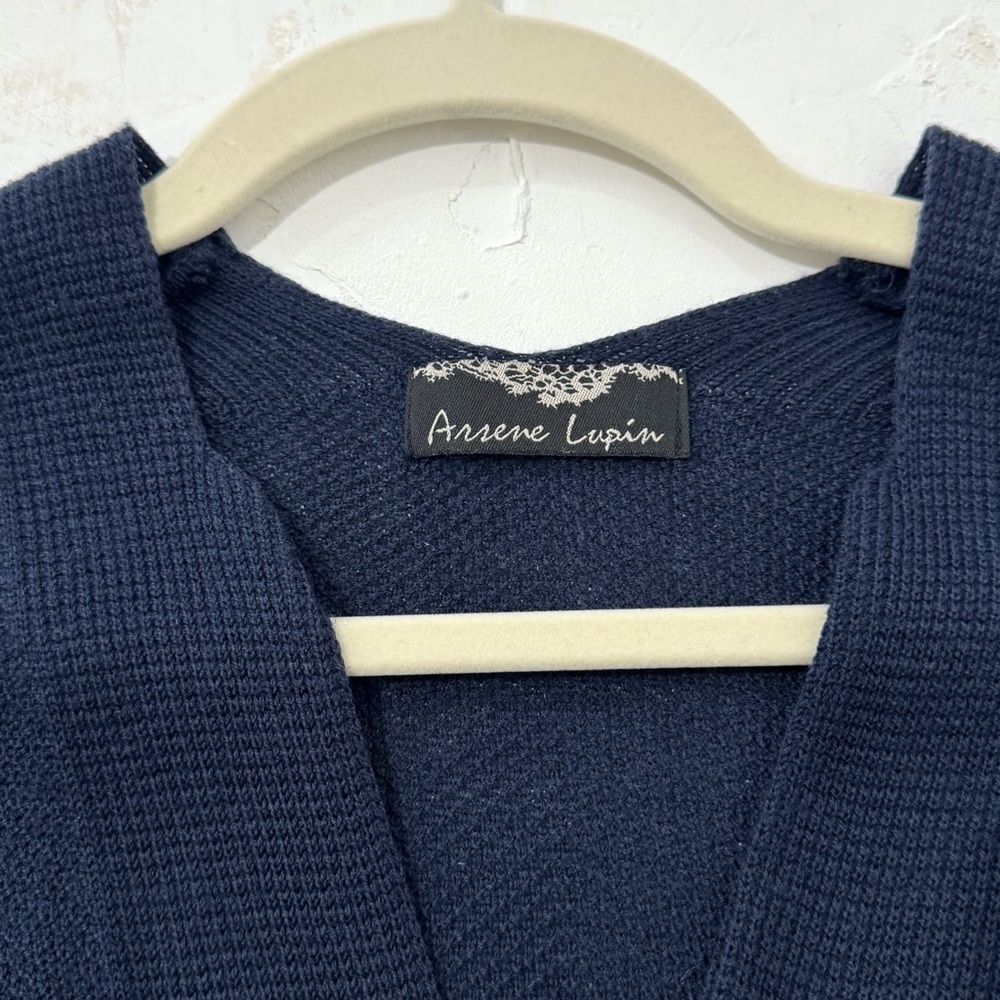 Elegant Navy Knit Cardigan with Satin Waist Tie
Made in Korea - Picture 4 of 8